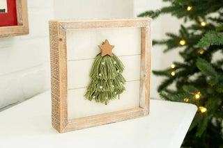 Wood frame sign 7x7 with a green tassel Christmas tree on a white backdrop