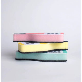 Scrubbly™ Kitchen Sponge: Rosé Rinse Repeat — three stacked pastel sponges in pink, yellow and teal with black scrubber edges