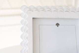 Wood scalloped photo frame in white for 8x10 photos.