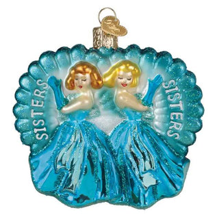 Sisters Sisters ornament: turquoise glass with two dancing sisters in blue gowns and glitter, gold hanger.