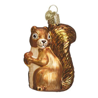 Squirrel ornament with brown and gold finish, holding an acorn, hanging Christmas ornament.