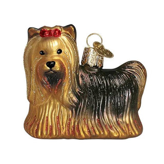 Yorkie ornament with golden and black fur, red glitter bow, and hanging loop.