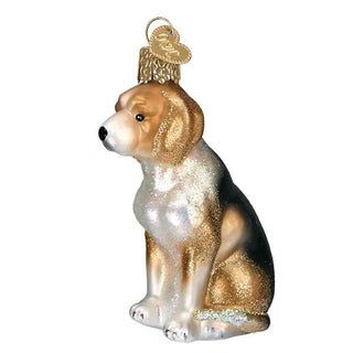 Beagle ornament with glittery gold and iridescent accents, white chest, black back, seated pose, gold cap hanger.
