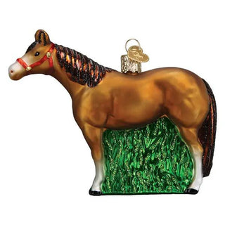 Quarter Horse ornament, golden-brown horse with black mane and red halter, on green textured base with hanging loop.