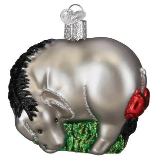 Eeyore ornament; silver-gray donkey with black mane, green scarf, and red tail.