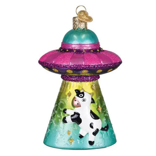 Cow Abduction ornament in teal and pink with a glitter UFO saucer and cartoon cow on a gradient base.