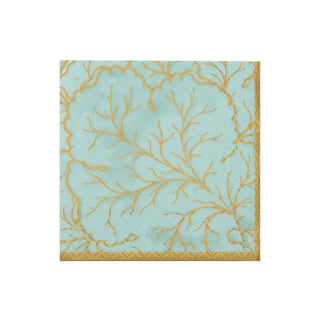 Cocktail napkin in turquoise with gold coral pattern.