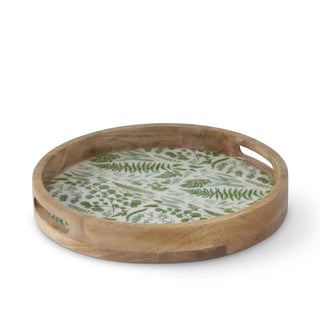 Fern enameled wood tray, round with green fern-pattern interior and cutout handles.