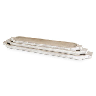 Long oval Paulownia wood decorative tray set in a whitewashed finish; 3-piece nesting display