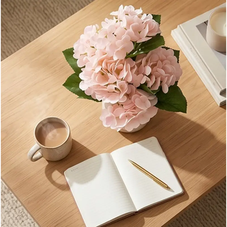 Light peach real-touch hydrangea bundle, 6 stems in a white vase on a wooden table