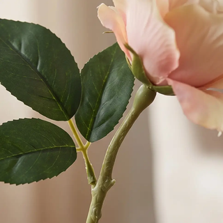 Light peach rose stem with pink-tinged petals and green leaves, 25-inch artificial flowering plant