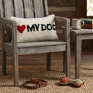 Cotton blend tufted lumbar pillow in natural with black lettering and a red heart reading I heart My Dog.
