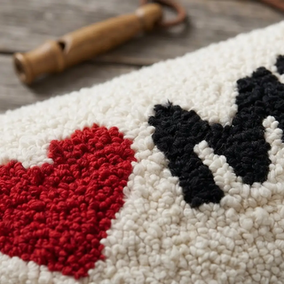 Lumbar pillow, cotton blend tufted in natural cream with red heart and black I heart My Dog lettering.
