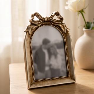 Arched Bow Frame picture frame in antique gold finish with beaded inner edge