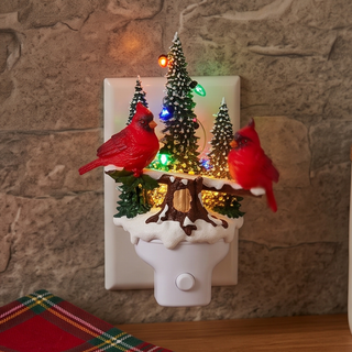 Animated Swirling Glitter Cardinal Night Light with red cardinals on a snowy log and colorful LED lights.