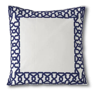 Square white pillow with blue applique border pattern