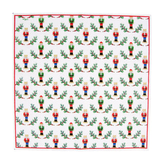Paper cocktail napkin featuring Little Nutcracker pattern, white background with red border and colorful nutcrackers