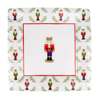 Little Nutcracker Square dinner plates with white center, red border, and repeating nutcracker motifs around the edge