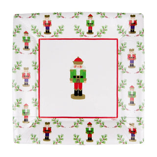 Little Nutcracker square disposable plates with a nutcracker border motif and central nutcracker image.