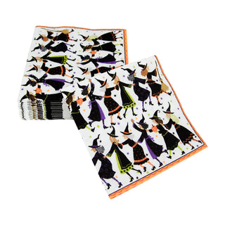 Pack of cocktail napkins featuring Witches Conga Line pattern; dancing witches in black and purple with an orange border