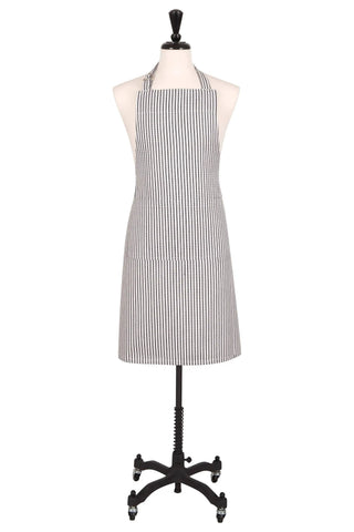 Striped chef's apron with black and white metro stripe; adjustable neck strap.