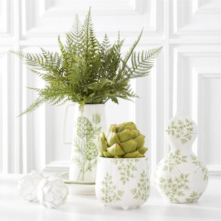 Green Foliage White Dolomite Pot with succulent plant, paired with matching white vases featuring green patterns.