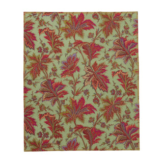 Guest towel napkin in sage green with a paisley leaf pattern.