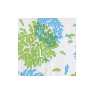 Cocktail napkin with turquoise and lime chrysanthemum pattern on white.