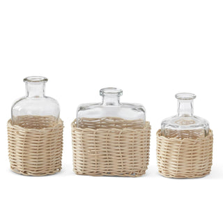 Set of 3 clear glass bud vases with woven natural rattan sleeves