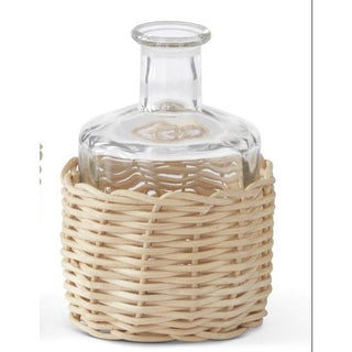 Glass bottle bud vase with a woven natural rattan sleeve