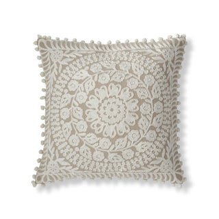 Pillow with pom pom trim, handcrafted beige and cream circle floral embroidery.