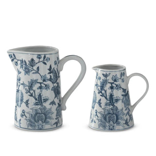 Porcelain chinoiserie pitchers, navy blue on white with floral motifs; set of 2