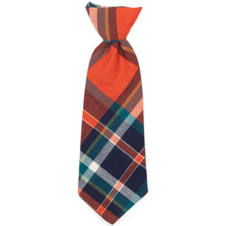 Dog necktie in orange and navy plaid fabric for a dapper look