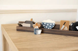 Wooden 2x2 in cooking shapes set (6) on a tray with kitchen icons on natural wood tiles