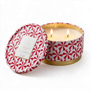 Peppermint Lane embossed luxe 12oz tin candle, red and white peppermint pattern, 2-wick with gold base