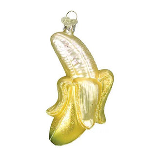Peeled banana ornament in shimmering gold with glitter finish.