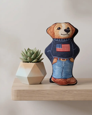 Ruff Lauren Teddy Dog plush squeaker toy; brown dog wearing denim jeans and navy sweater with American flag