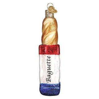Baguette ornament with glittery gold crust, red cap, white wrapped body with text, blue glitter base