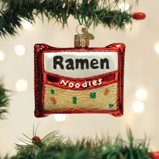 Ramen Noodles Ornament, red glitter frame with white label and tan noodle bowl design