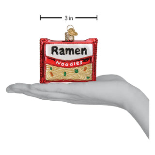 Ramen Noodles ornament, red square holiday decoration with a white label and beige noodles.