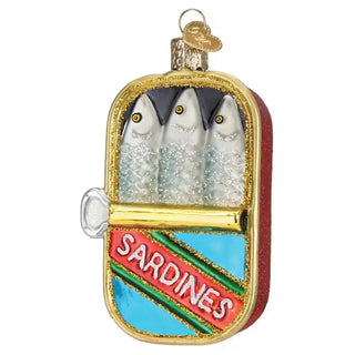 Sardines ornament featuring three fish heads in a gold frame with a blue panel and red SARDINES banner