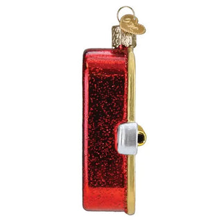 Sardines ornament, red glitter glass with gold trim and hanging loop.