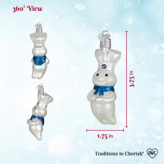 Doughboy ornament with blue scarf and silver cap, white glossy finish; 3.75 in tall, 1.75 in wide