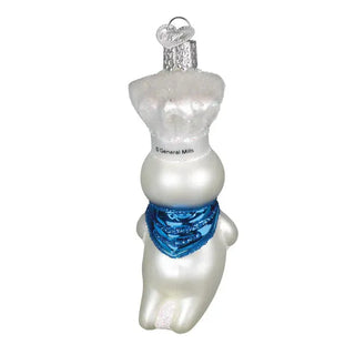 Doughboy ornament in pearl-white glass with a blue scarf for holiday décor.