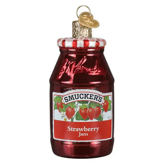 Strawberry jam ornament in a red glass jar with a striped white-red cap and gold hanging loop.
