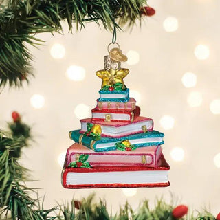 Book Club Tree Ornament, colorful stacked-book design with gold accents and star topper.