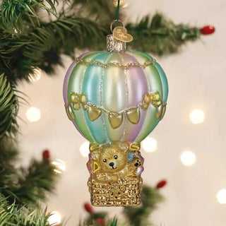 Baby bear balloon ornament; pastel iridescent balloon with a gold basket.