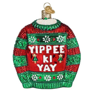 Yippee Ki Yay sweater ornament; red and green striped glass decoration with white snowflakes, YIPPEE KI YAY lettering