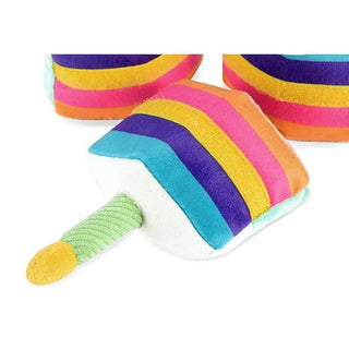 Bone-appetit cake plush toy, rainbow-striped blocks with a green rope handle
