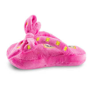 Wagentino sandal dog toy, plush bright pink with yellow square accents, knotted strap, and squeaker toy